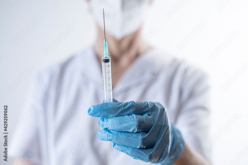 nurse preparing syringe for vaccination nurse preparing syringe for vaccination