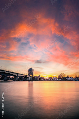 The historic Nibelungen Bridge in Worms on the Rhine. This beautiful motorway bridge in Germany serves as a city access road. Photographed as long exposure in sunset © Jan