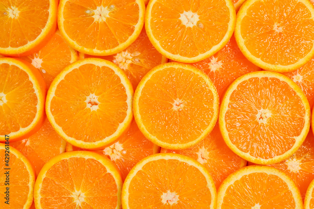 Slices of oranges as a background, top view. Slices of oranges as a background, top view.
