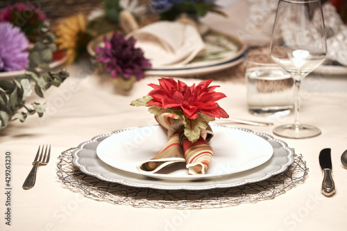 handmade napkin rings with artificial flowers  