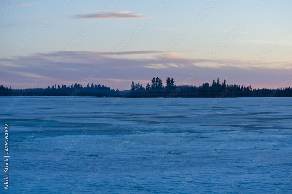 A Beautiful Sunset at Astotin Lake while it is still Frozen