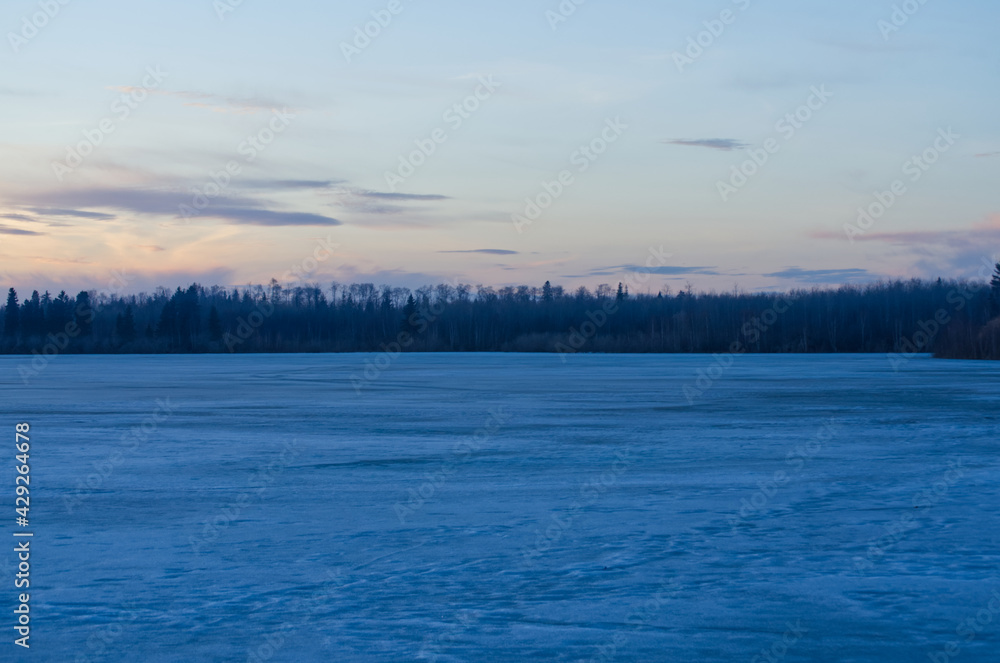 A Beautiful Sunset at Astotin Lake while it is still Frozen A Beautiful Sunset at Astotin Lake while it is still Frozen