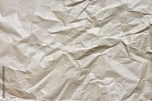 beige crumpled craft paper background