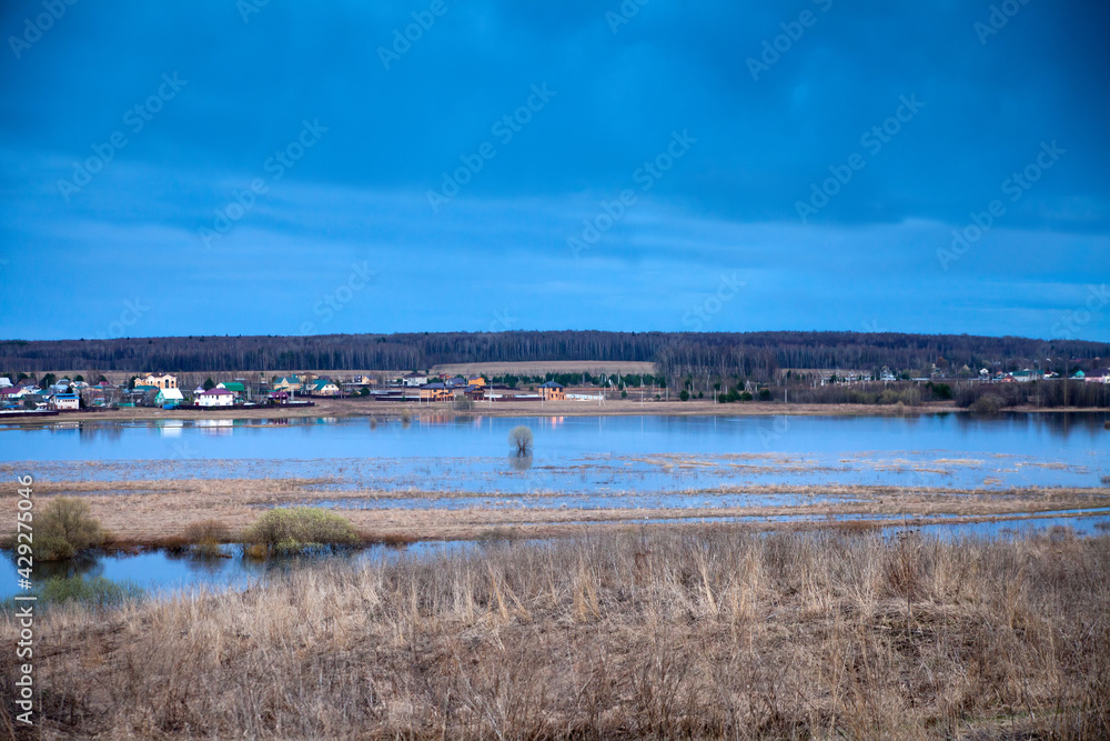 High water level in   river. Rural landscape in early spring