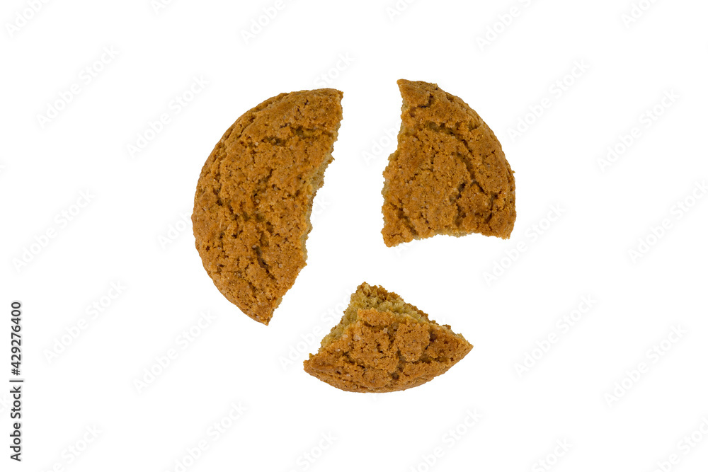 Cookies broken into three parts isolated on a white background. Cookies broken into three parts isolated on a white background.
