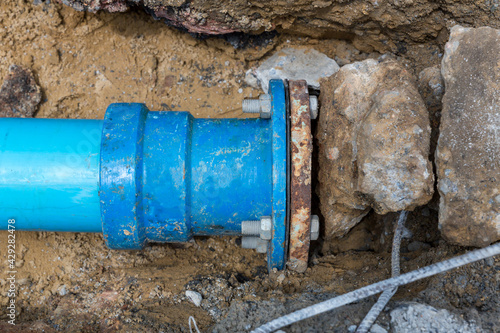 Wallpaper Mural Construction site with new Water Pipes in the ground. sewer pipes to repair or restore in street city Torontodigital.ca