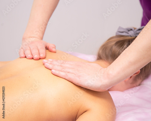 Massage closeup, cosmetologist procedure, acupressure. Backrub close up