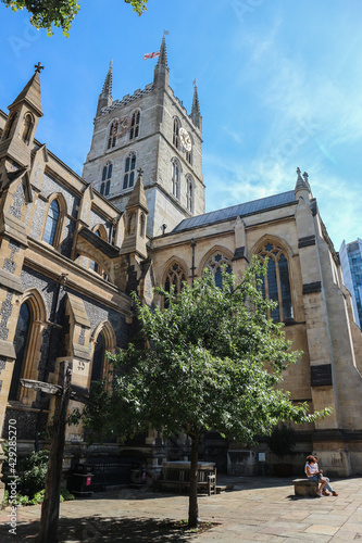 Wonderful gothic Southwark cathedral, London, photographed against the blue sun