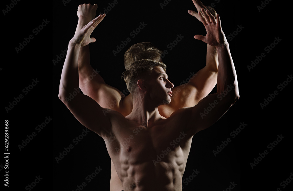 Strong athletic men, fit male models. Sexy muscular men with bare naked  body torso. Man naked torso in underwear with athletic body on black  background. Stock Photo | Adobe Stock