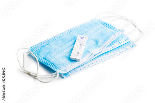 Covid-19 rapid antigen test. Rapid antibodies test kit and protective medical face mask.