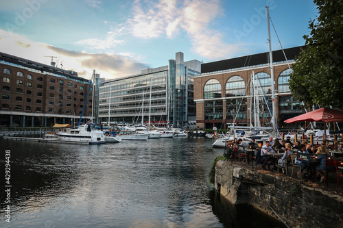 St. Katharine Docks Marina, wonderful part of the London city situated in the calm marina with anchored ships by the Thames river