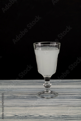 Raki - Turkish or Greek alcoholic drink, distilled from grapes and flavored with anise, when mixed with water becomes milky white