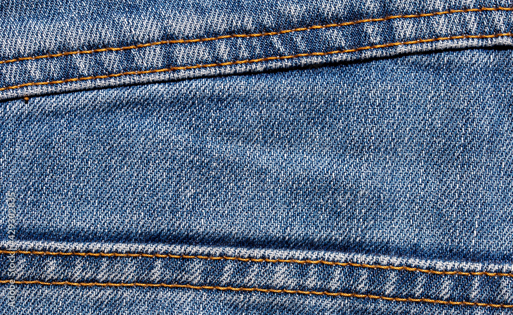 texture of blue jeans denim fabric background
texture of blue jeans denim fabric background