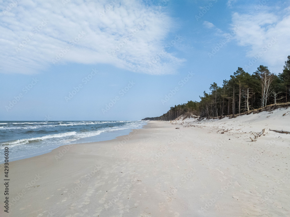 Beach with white sand in Slowinski national park, Baltic coast of Poland