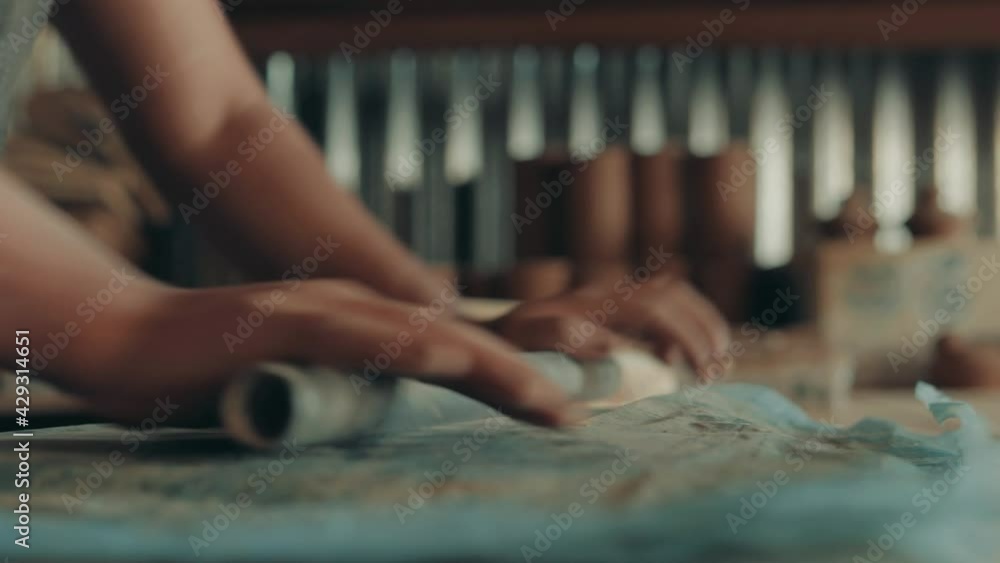 Image Of A Pottery Maker Kneading Clay At The Workshop Using Metal Pole Near Lake Atitlan In Antigua Guatemala, Central America. - Close Up Shot