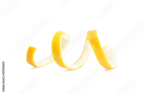Fresh peel of lemon on white background