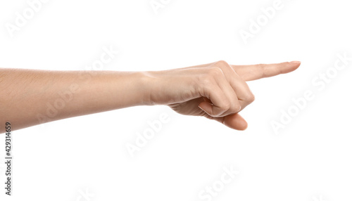 Woman pointing with index finger on white background, closeup