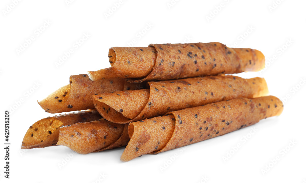 Delicious fruit leather rolls on white background Delicious fruit leather rolls on white background