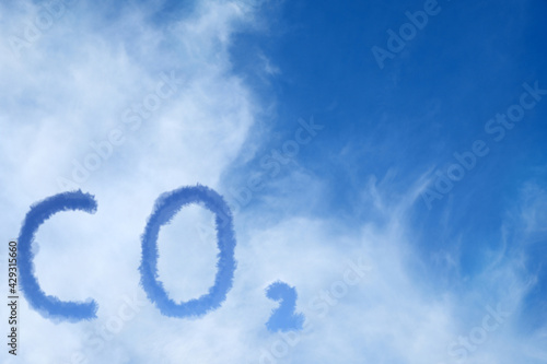 CO2 emissions. View of blue sky with white clouds