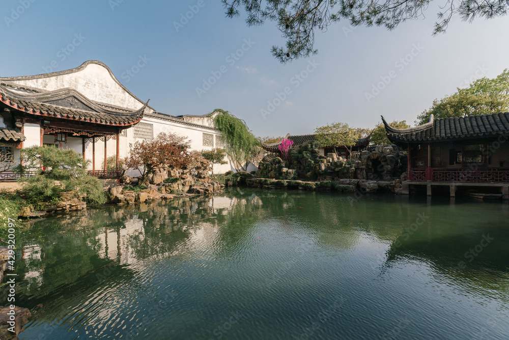 Landscape and buildings in Master of the Nets Garden, a classical Chinese garden in Suzhou, China