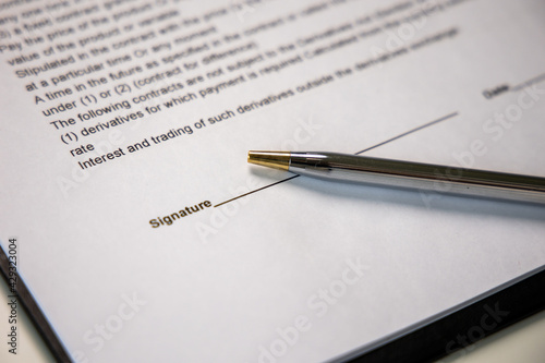 Wallpaper Mural Business agreement signing document And a pen for business people Torontodigital.ca