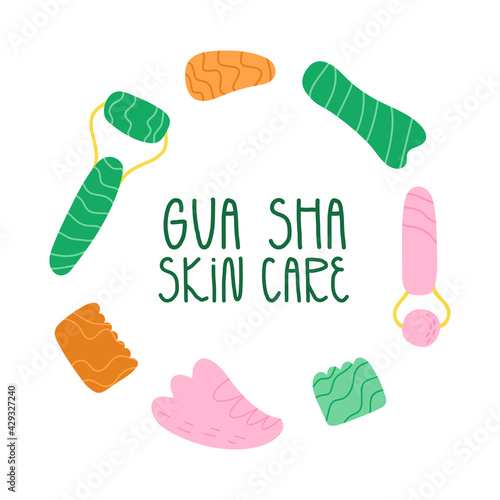 Various Gua Sha scraper, face rollers, massagers frame with hand lettering in the middle. Anti-aging and skincare tools.