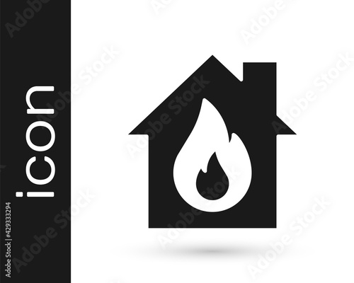 Black Fire in burning house icon isolated on white background. Vector