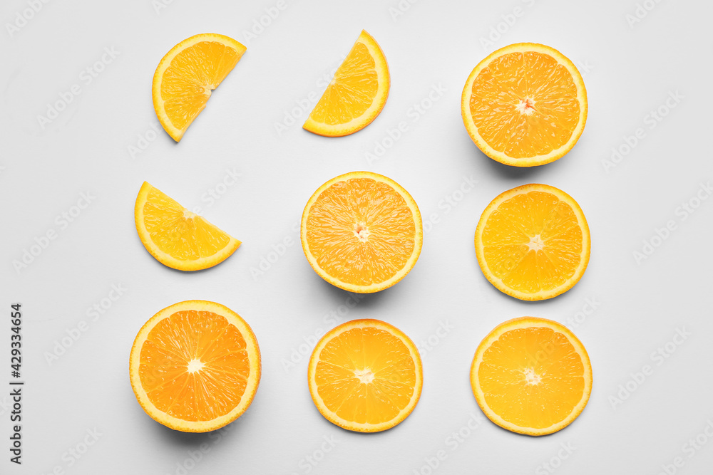 Pieces of fresh orange fruit on white background Pieces of fresh orange fruit on white background