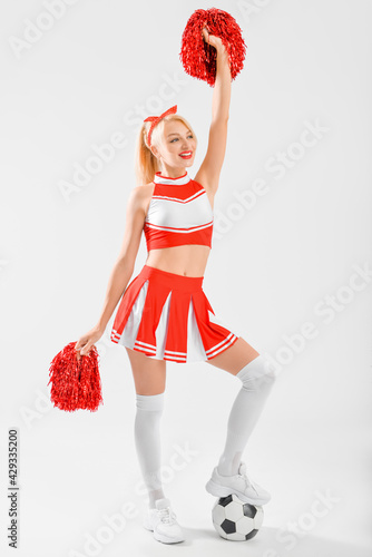 Beautiful cheerleader with ...