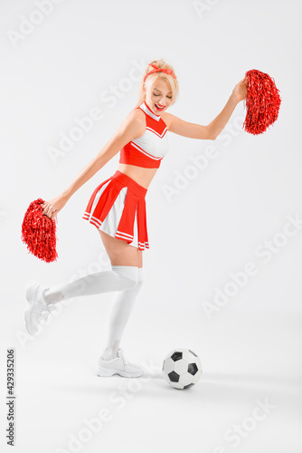 Beautiful cheerleader with ...