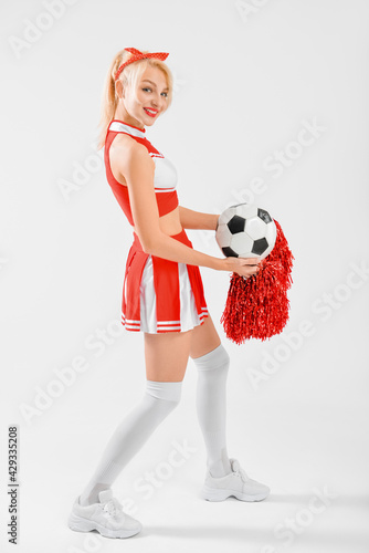 Beautiful cheerleader with ...