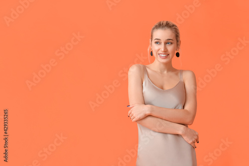 Fashionable young woman on ...