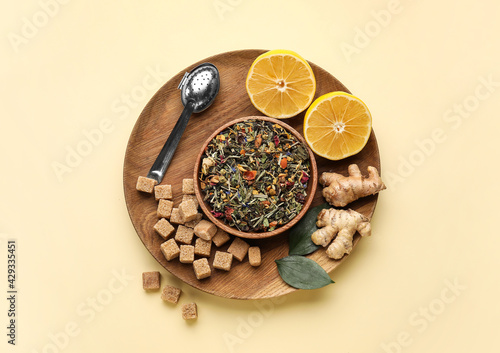 Composition with ingredients for tasty ginger tea on color background