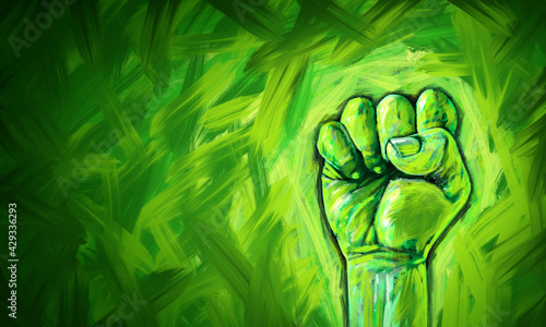 Ecological justice abstract concept as a fist painted in diverse green colors fighting for the environment and environmental and ecological equal rights and conservation social fairness photo