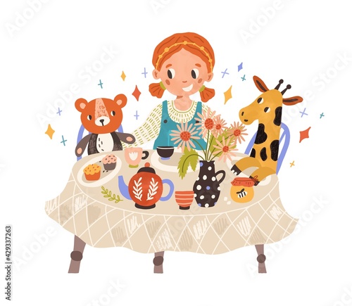 Happy girl playing with cute plush toys, imagining tea ceremony. Little kid s...