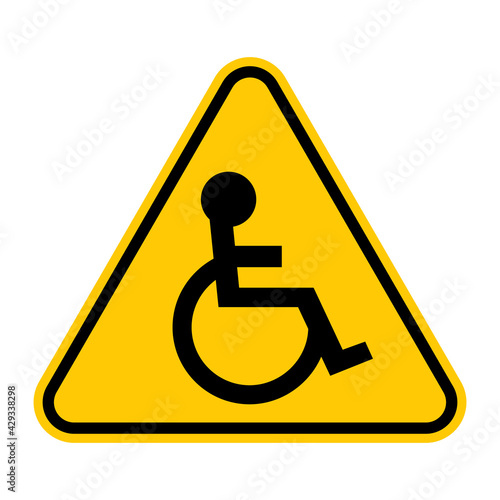 Caution disabled. Vector illustration of yellow triangle warning sign with handicapped icon inside. Man in wheelchair symbol. Attention.