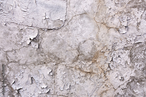 old white concrete with cracks from old age wall texture. for your design and background texture