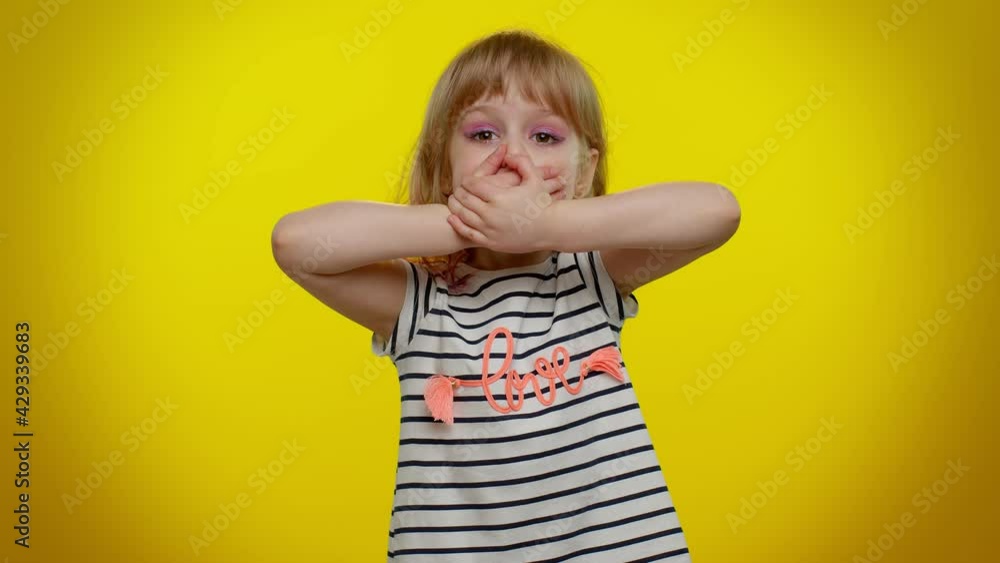 I will not say anyone. Frightened little blonde teen kid child girl closing her mouth with hand, looking intimidated scared at camera, gestures no, refusing to tell terrible secret, unbelievable truth I will not say anyone. Frightened little blonde teen kid child girl closing her mouth with hand, looking intimidated scared at camera, gestures no, refusing to tell terrible secret, unbelievable truth
