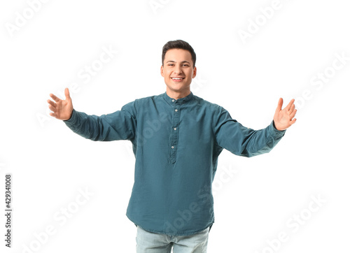 Young man opening arms for ...