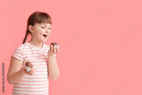 Cute little girl with choco...