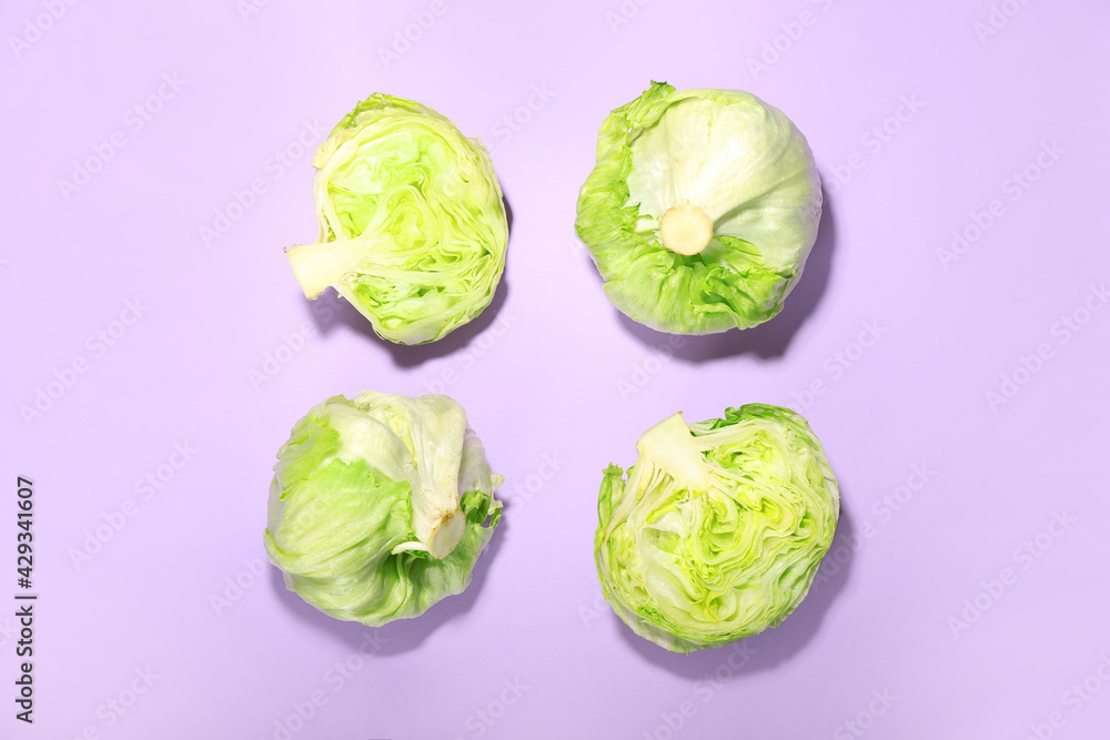 Fototapeta premium Iceberg lettuce on color background