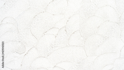 コテあとの残る白い壁の背景テクスチャー