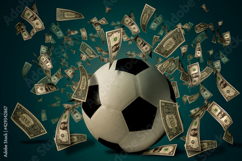фотографія Soccer ball with dollar bills. Betting ideas