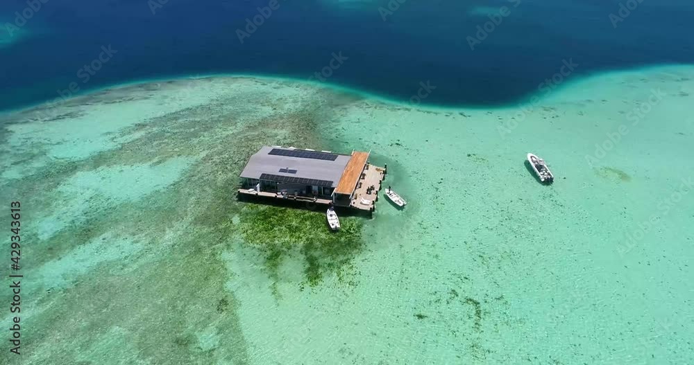 Aerial Point Of Interest View pile dwelling sea house Los Roques VENEZUELA turquoise waters in the Caribbean sea Aerial Point Of Interest View pile dwelling sea house Los Roques VENEZUELA turquoise waters in the Caribbean sea