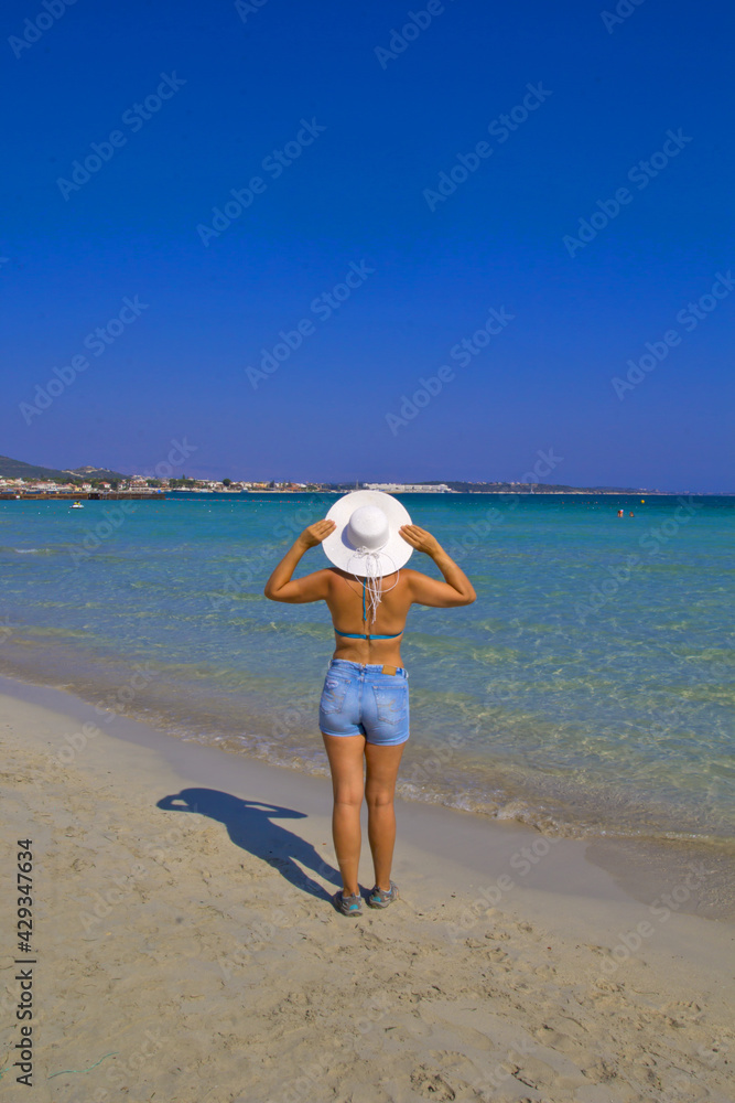 beautiful young woman in bikini on the beach	