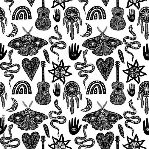 Seamless celestial pattern, black and white boho symbols seamless pattern. Silhouettes of rainbow, guitar, moth, hand, snake, feather, dream catcher, moon, sun. Vector illustration in linocut style.