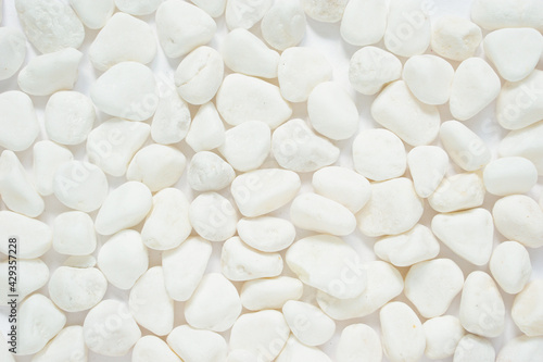 surface of Clean white pebbles for background.