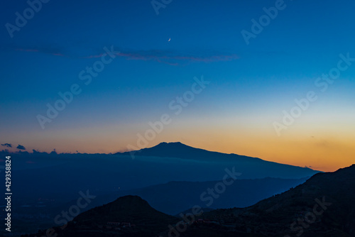 Blue hour landscape view of Etna volcano in Sicily, Italy. Mountain silhouettes by Twilight 