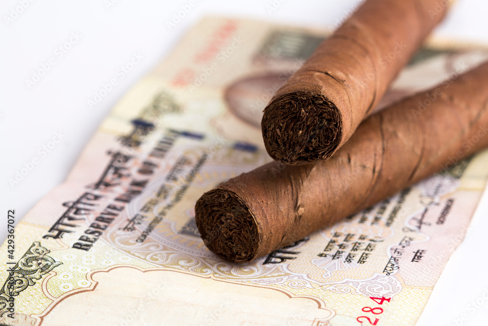 Cash and cigars stock photo Cash and cigars stock photo