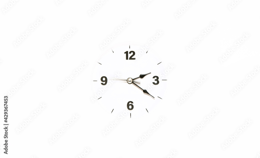 Passing of time - blurred moving second hand on a clock dial Passing of time - blurred moving second hand on a clock dial